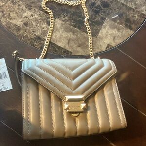 Michael Kors purse never worn has price tags no scratches or tears